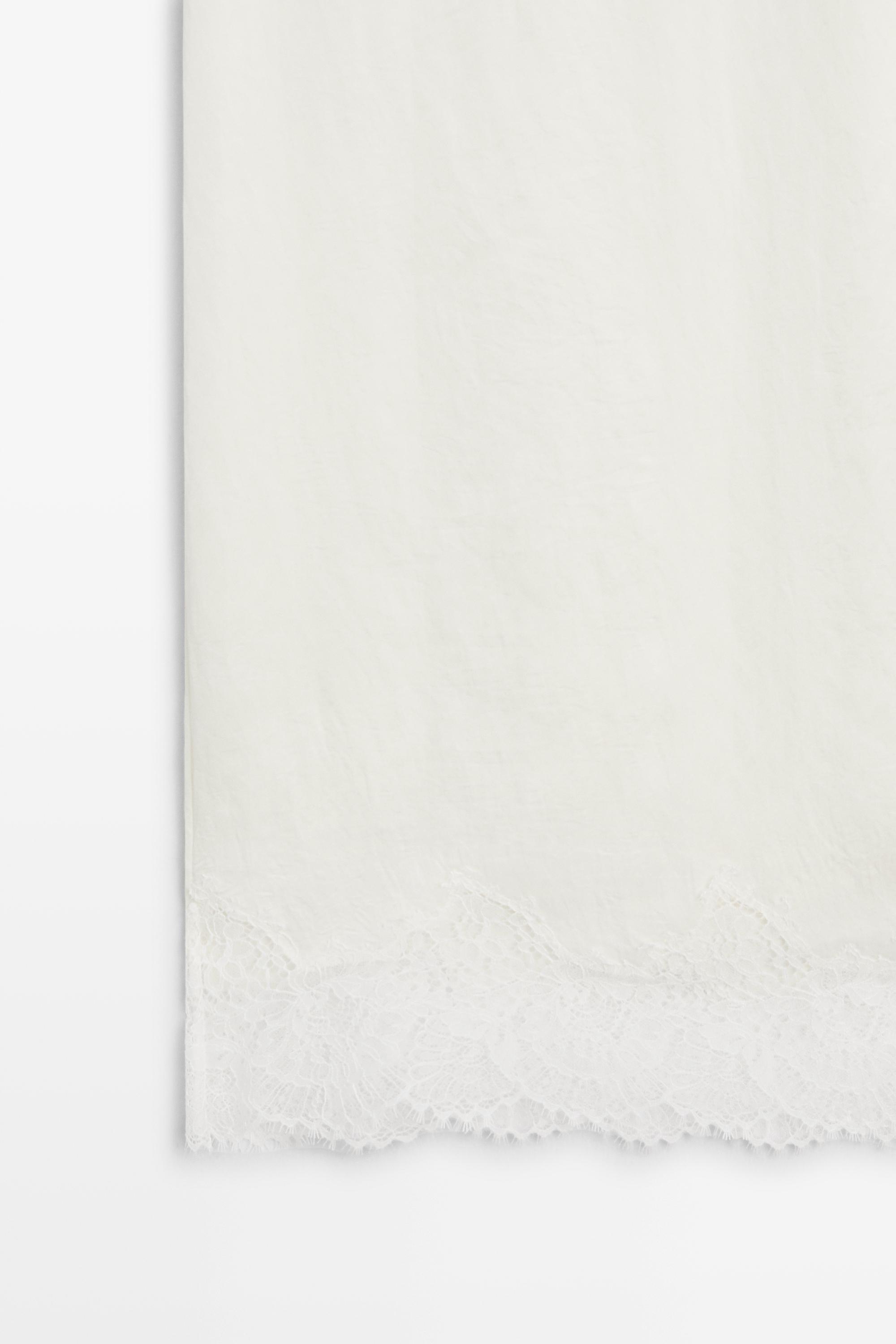 Flowing midi skirt with lace detail